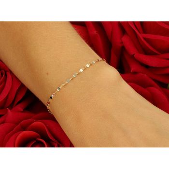 Delikatna złota bransoletka damska próby 585 złożona z drobnych blaszek. Długość 19 cm, waga 0,67 g, szerokość 1,7 mm, zapięcie na karabińczyk. 2.jpg